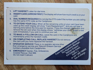 Card with text on a wooden surface