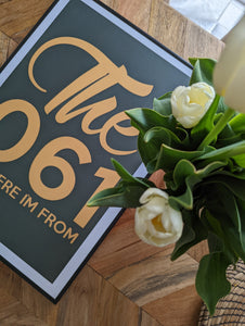 Print "The 061" with flowers